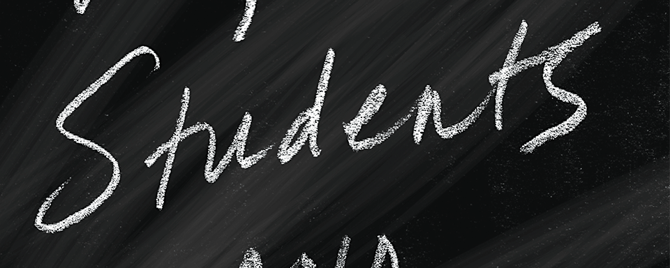 Black background with the word "students" written in white chalk