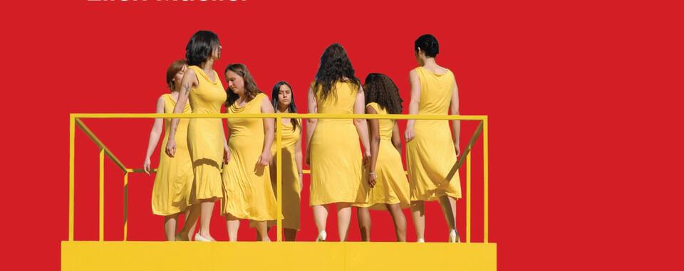Women in yellow dresses walking