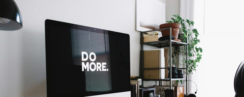 Computer screen displaying the words "Do More"